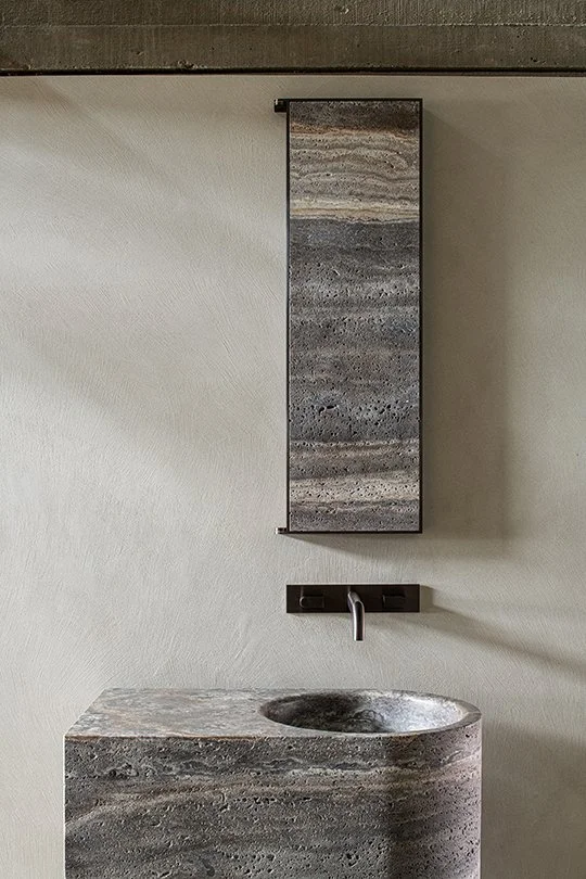 CEA Design SIXTY freestanding washbasin and tap collection by Glenn Sestig, crafted in Travertine Titanium Marble and stainless steel, supplied across Dorset, Hampshire and Surrey.