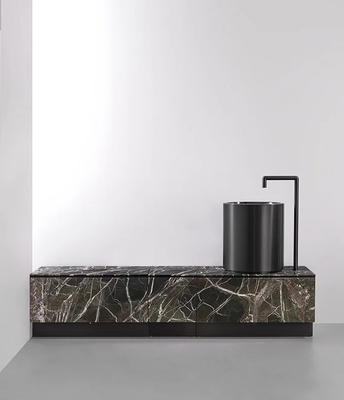 CEA Design luxury taps with black porcelain vanity and round black sink, designed by Abitalia South Coast in Poole, Dorset, UK.