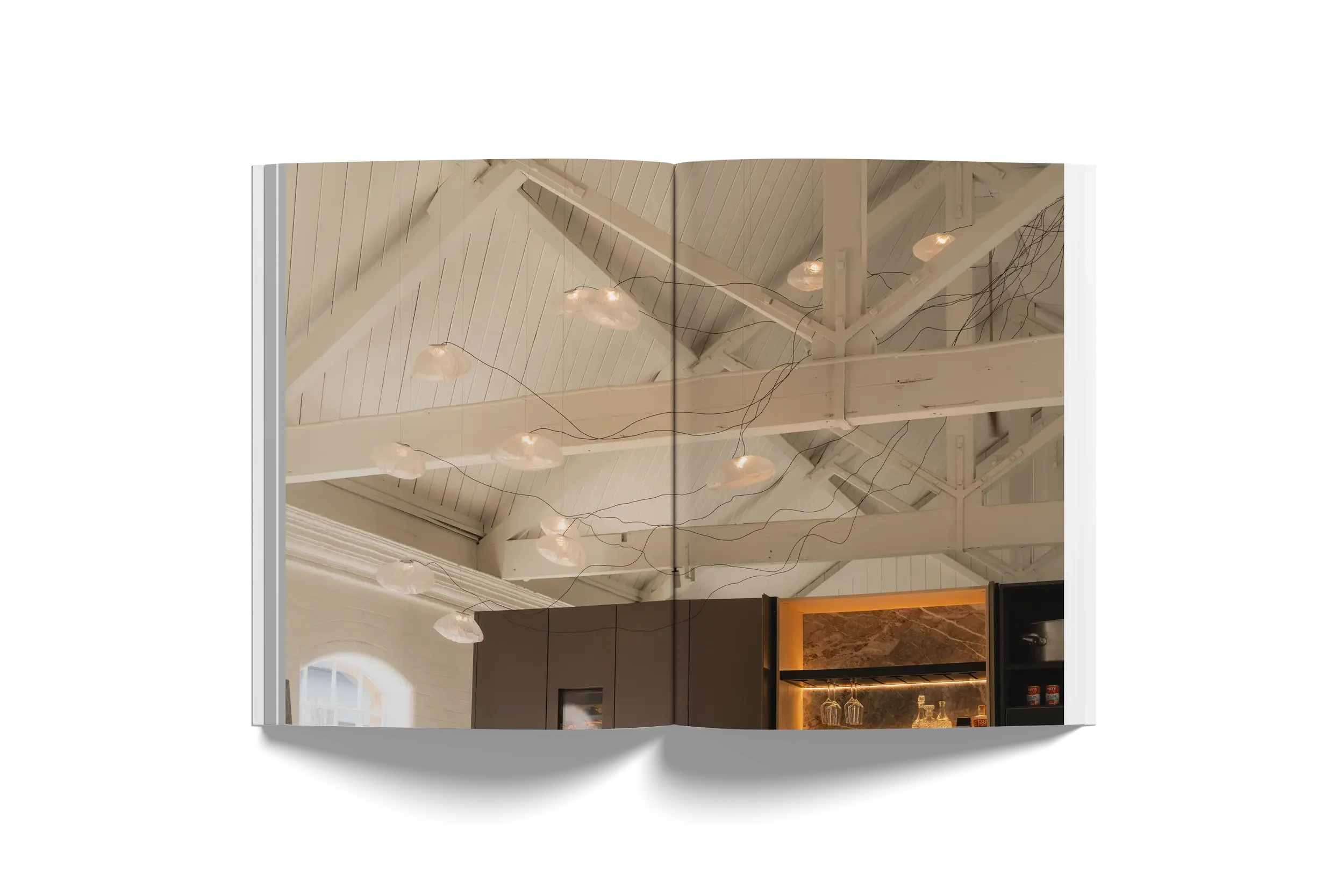 Abitalia South Coast, Poole, Dorset, UK features a display kitchen and 73.13 series  pendant lighting by Bocci.