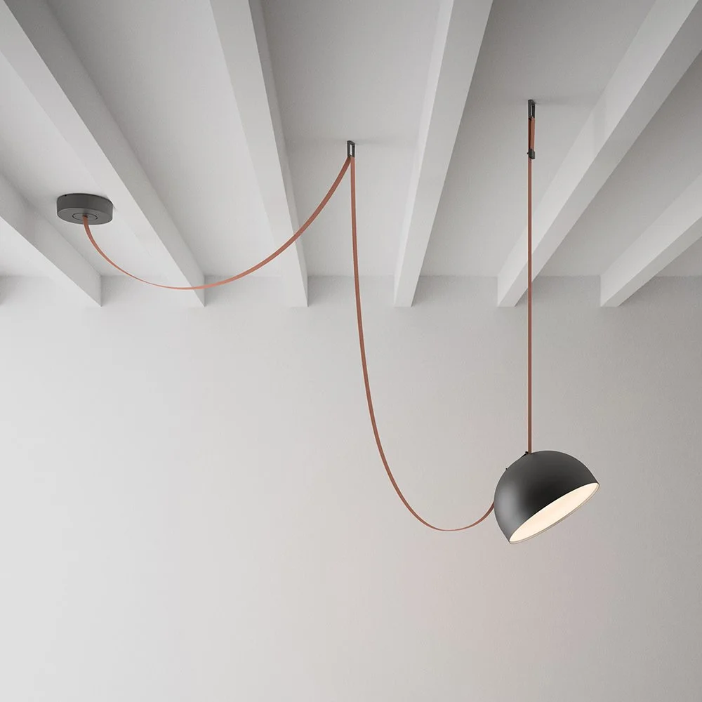 Vibia Plusminus Semispheres Pendant Lamp with canvas or leather belt design and metal semisphere shade, supplied by Abitalia South Coast in Dorset, Hampshire, and Surrey.