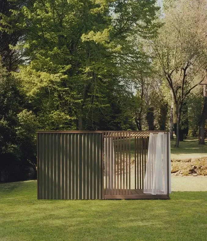 Effe Perfect Wellness Cabanon outdoor sauna designed by Rodolfo Dordoni, featuring corrugated aluminum walls and expansive glass panels for seamless outdoor integration, supplied by Abitalia South Coast in Dorset, Hampshire, and Surrey.