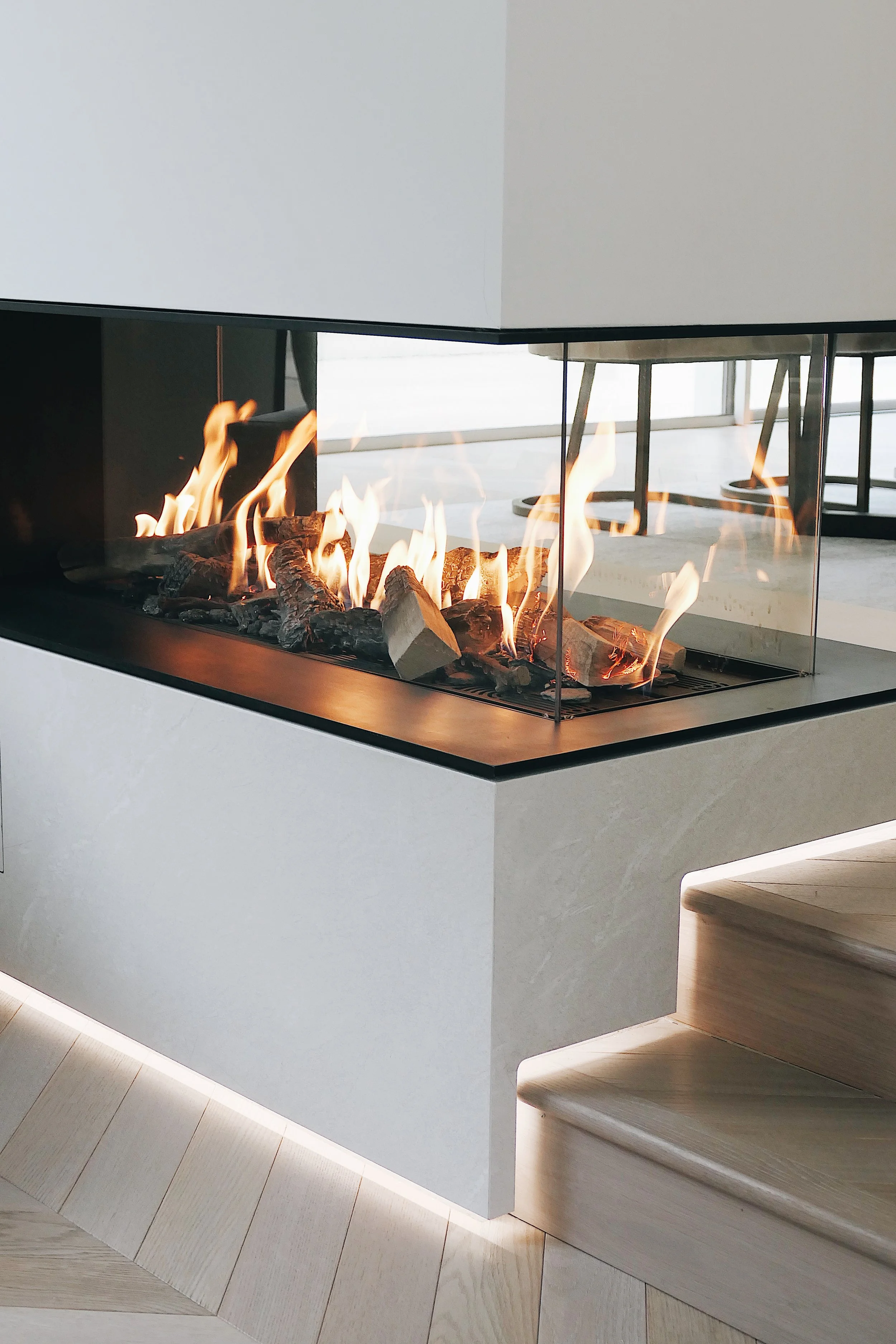 Minimal and clean fireplace designed by Abitalia South Coast in Canford Cliffs.
