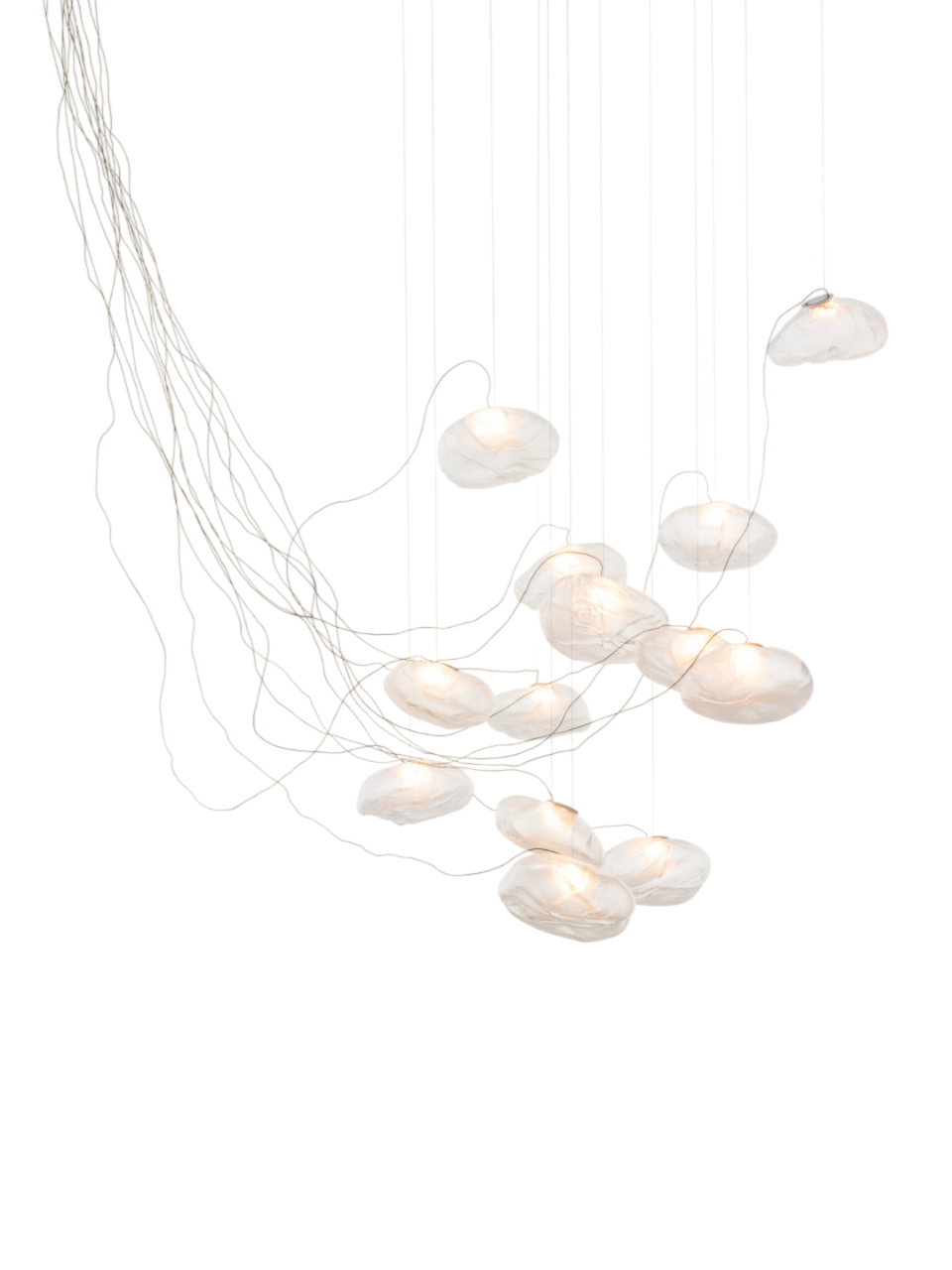 73 Series pendant light by Bocci suspended individually, showcasing the hand-blown glass globe and soft ambient illumination.