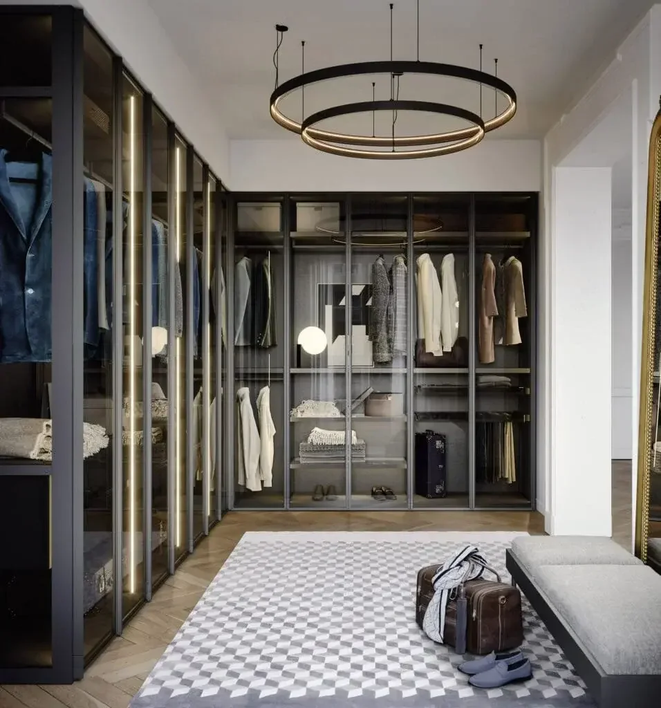 Luxury designer wardrobe by Novamobili with oxidised bronze frame and smoked glass doors.