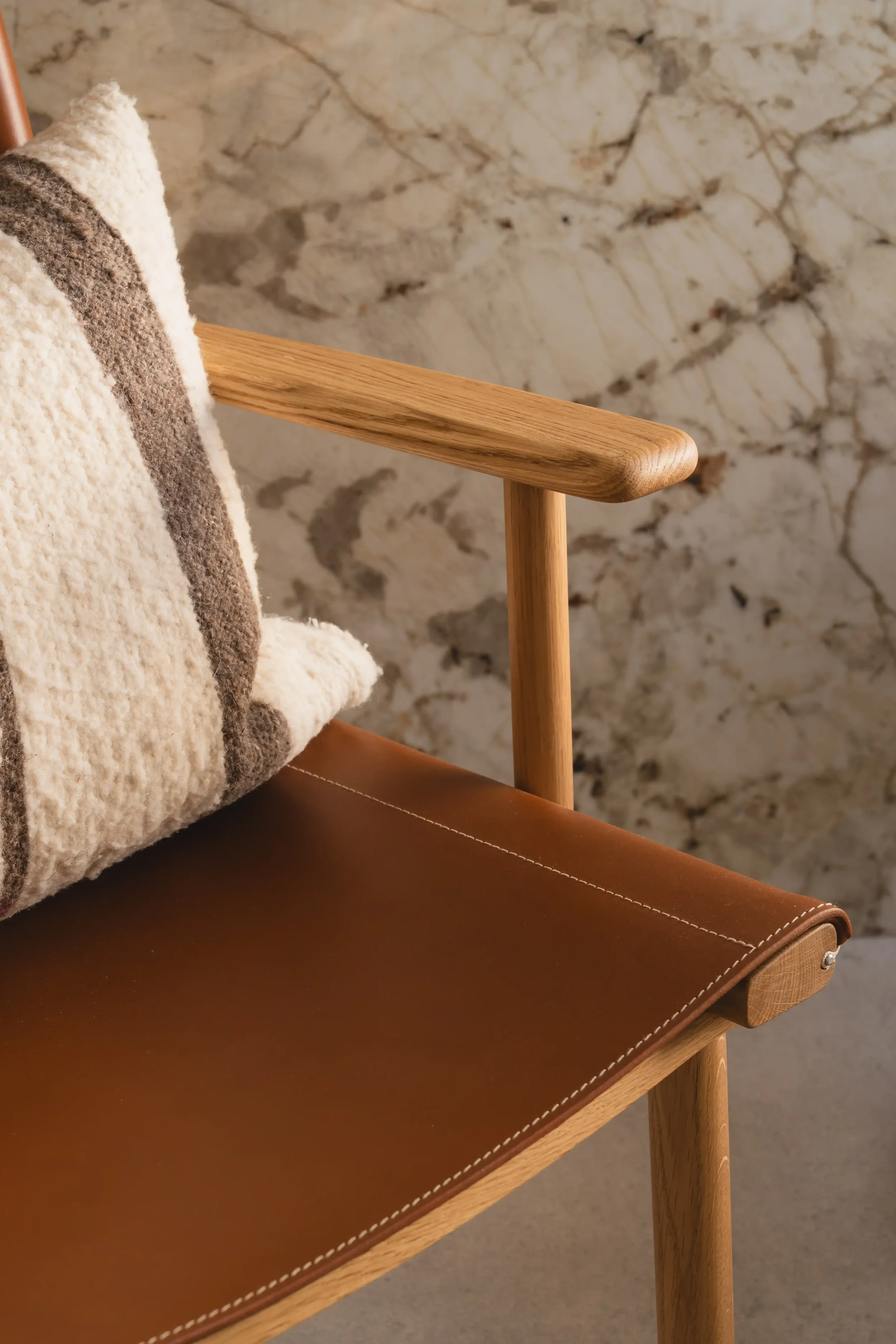 Generous seat and high-quality upholstery showing comfort and premium materials.