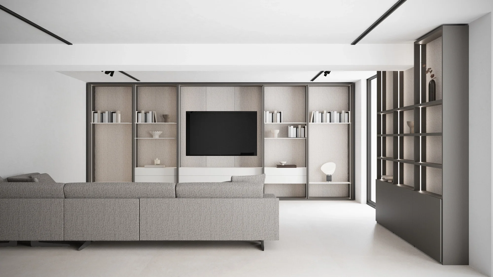 Zenit floor-to-ceiling media wall with TV recess and open display shelving, luxury living room in Hampshire by Abitalia South Coast.