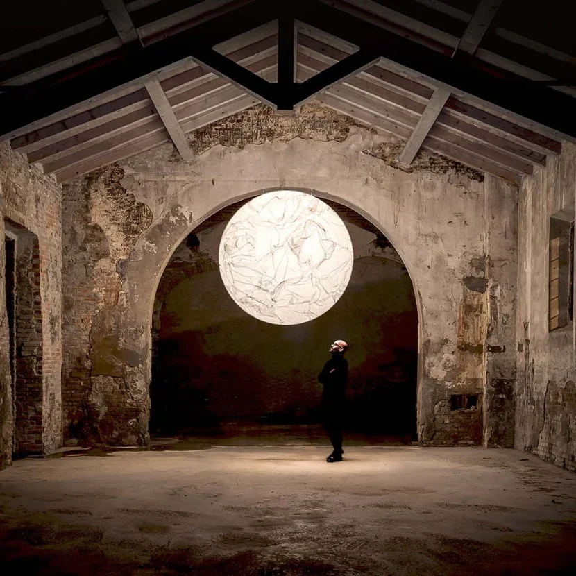 Detail highlighting handcrafted construction and fine lunar-inspired texture.