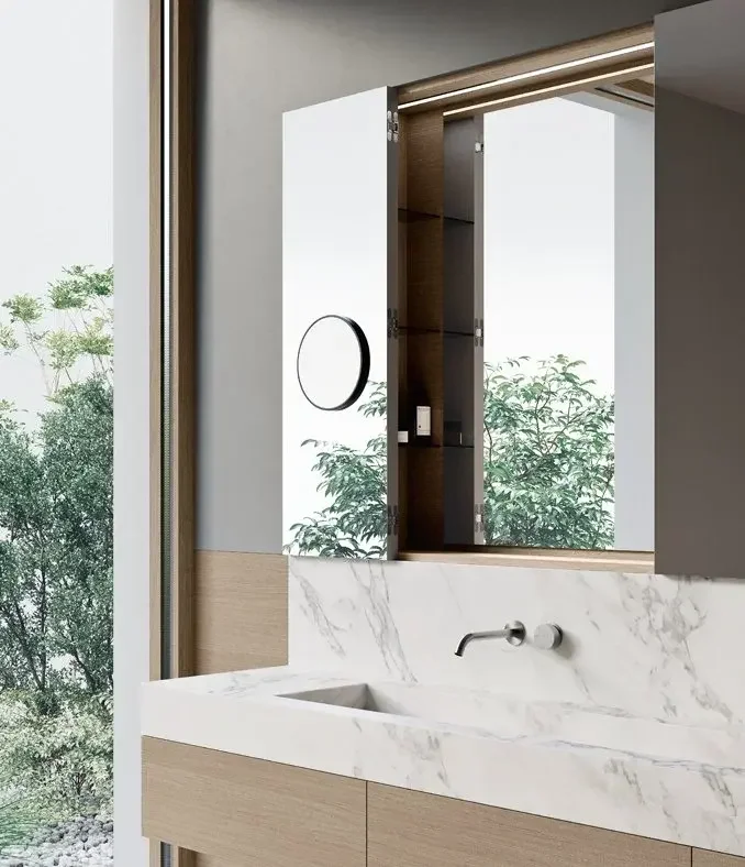 Makro Elements bathroom wall system with white porcelain sink, wooden cabinetry, open shelving, and large mirror, showcased by Abitalia South Coast in Poole, Dorset, UK.