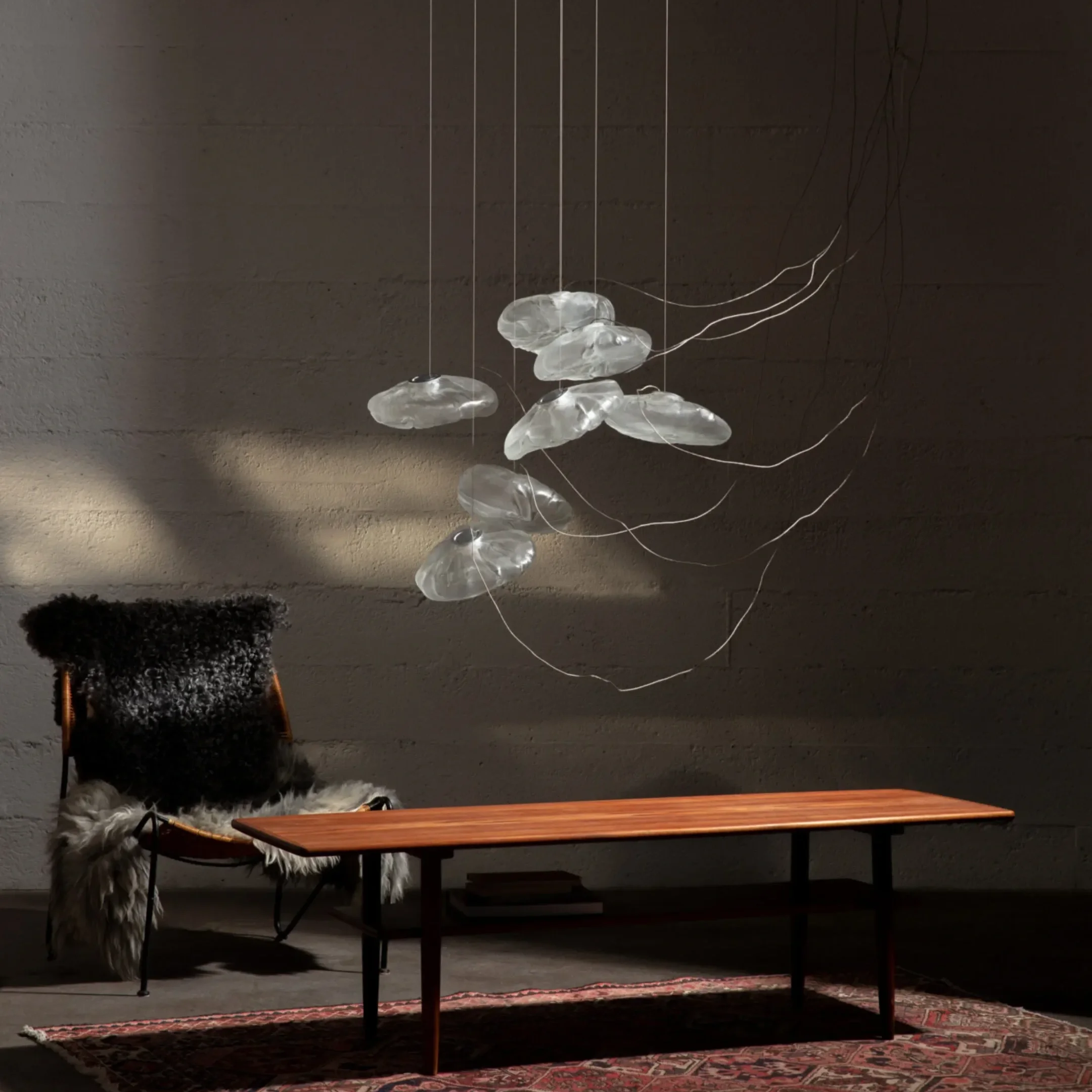 73 Series Pendant Light by Bocci creating ambient lighting in contemporary interior.