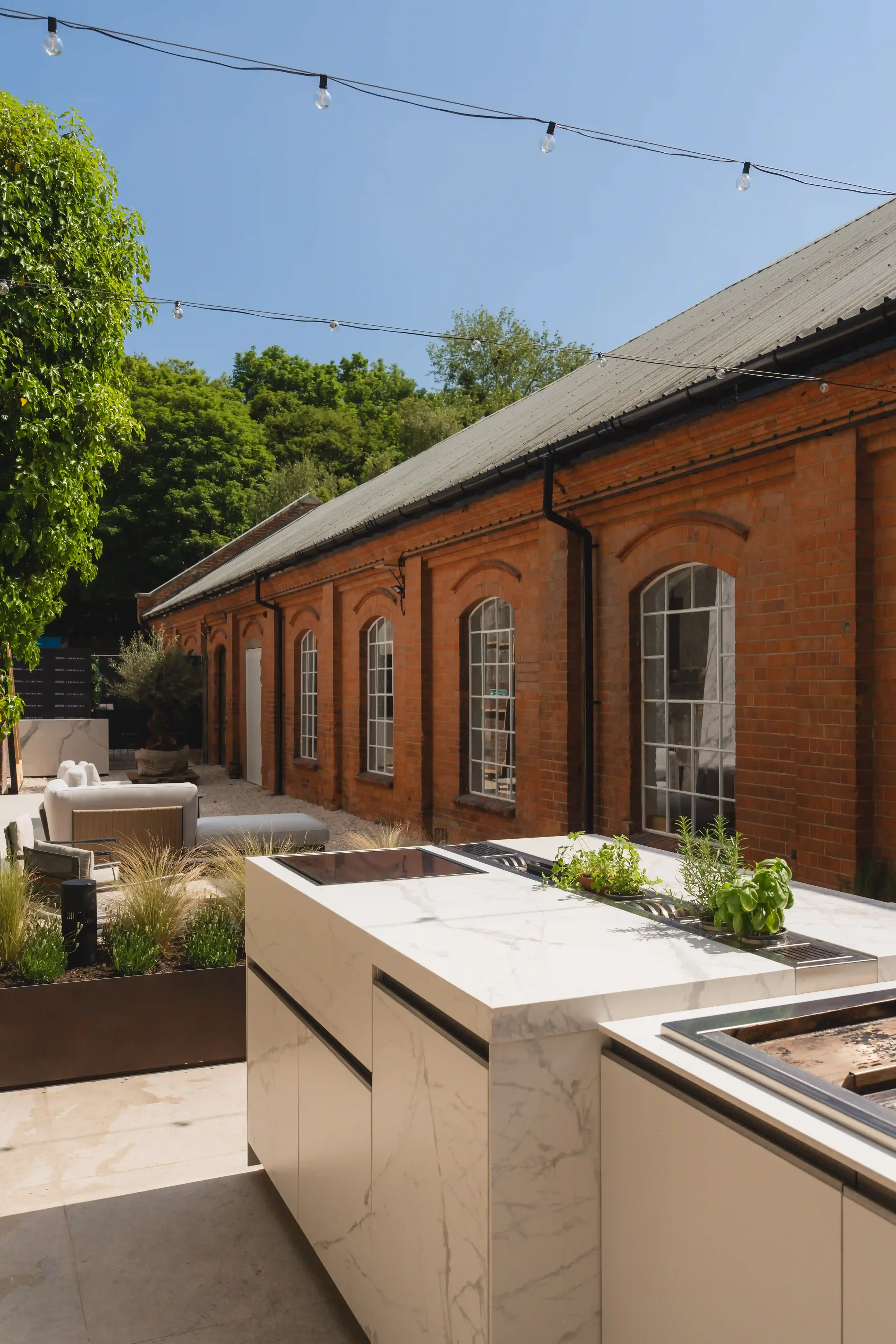 Minimalist outdoor kitchen island designed for open-air entertaining and everyday use.