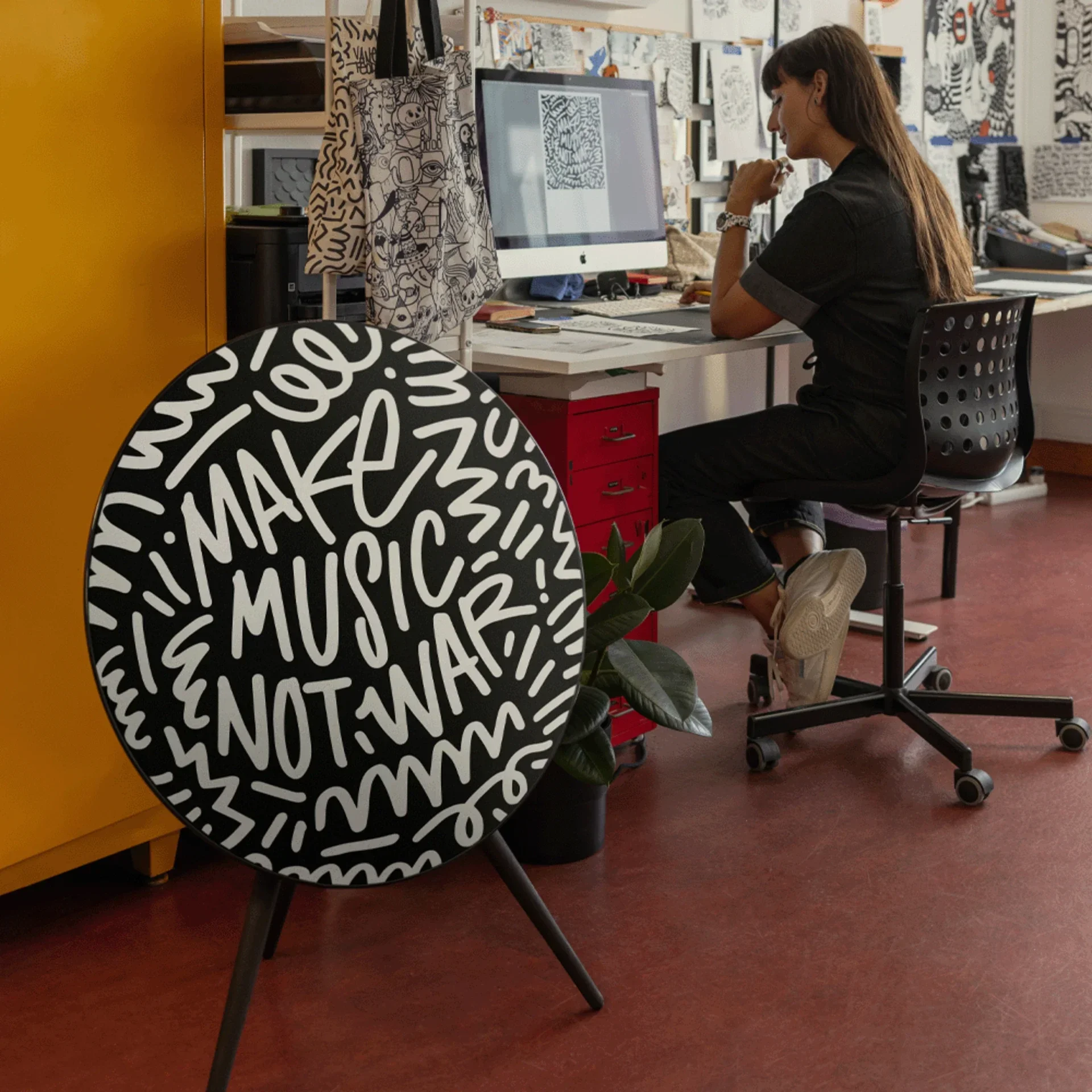 Bang & Olufsen Beosound A9 speaker with circular design and customizable fabric.