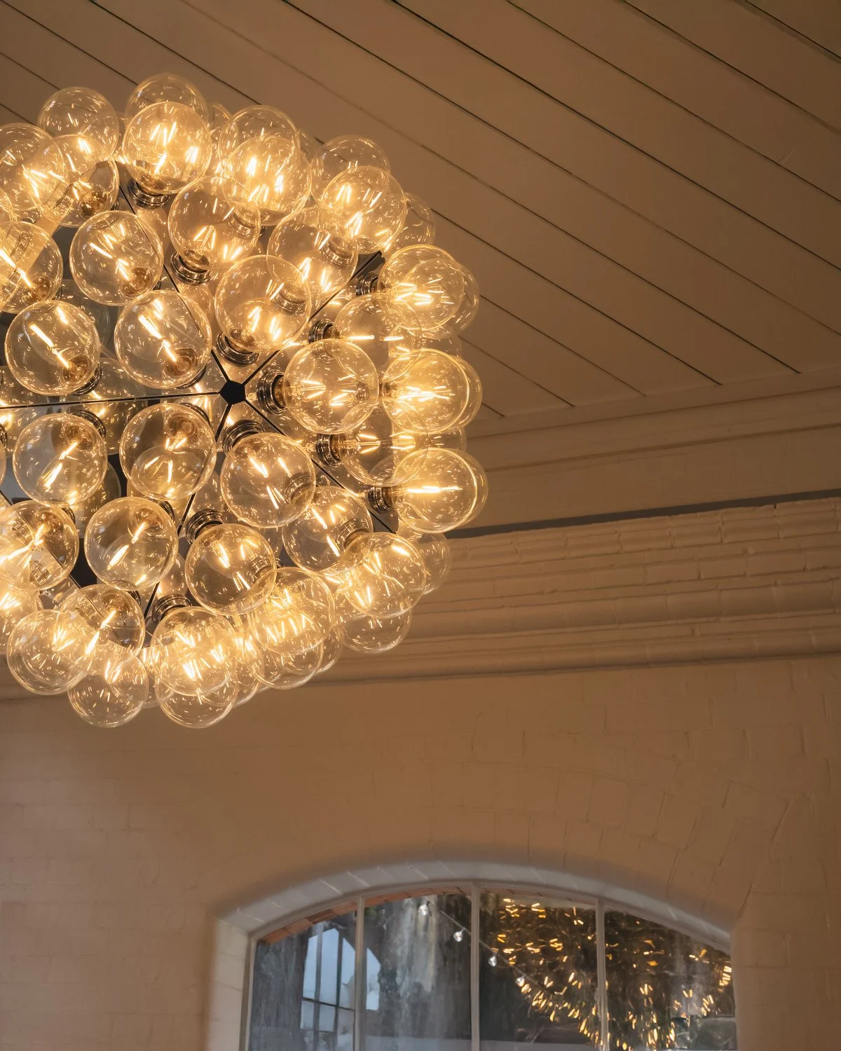 Close-up view of Taraxacum 88 detailing the polished structure and clustered light sources that create depth, rhythm, and visual lightness.