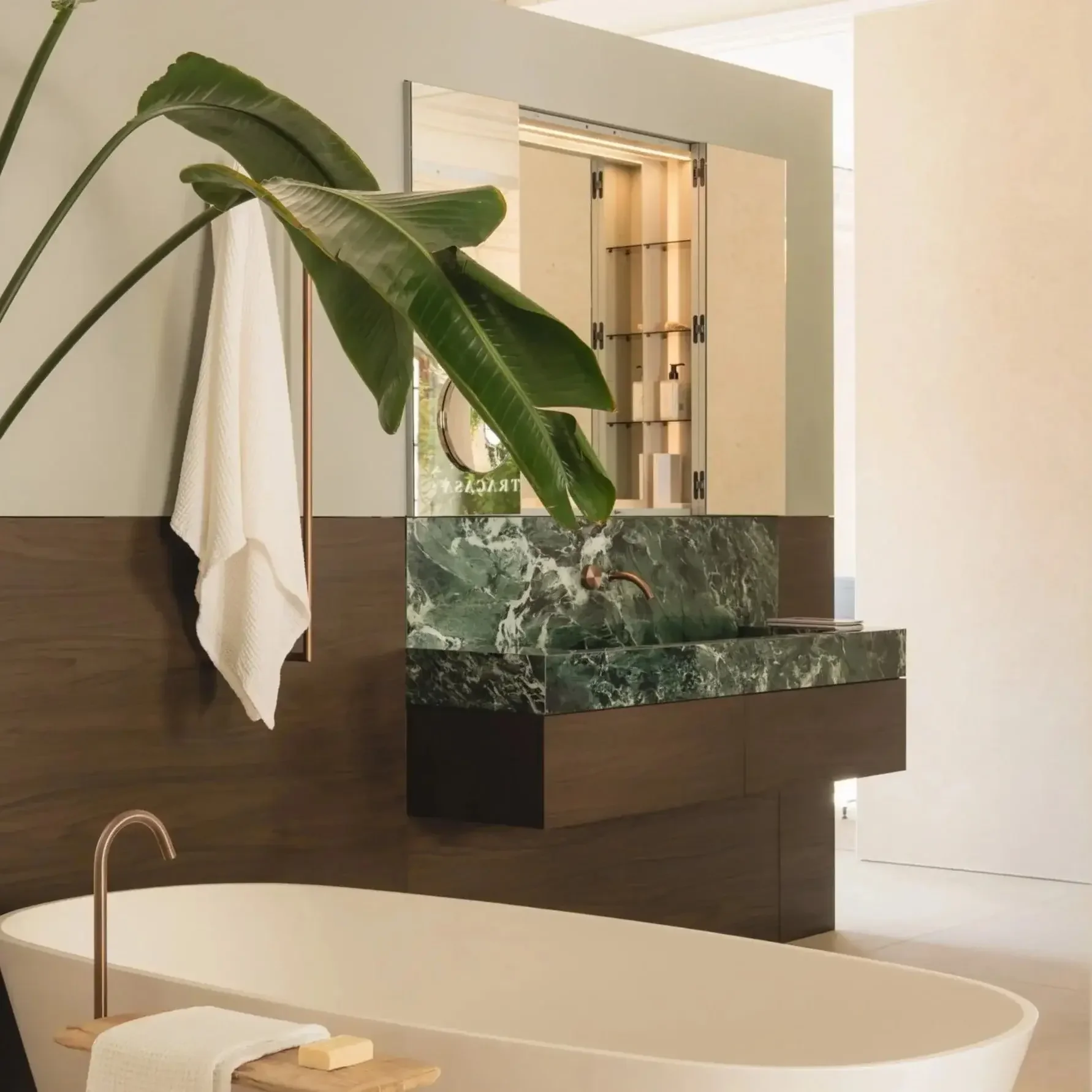 Maxi Sink and Vanity by Makro with Verde St Denis sink and Noce oak drawers in modern bathroom.