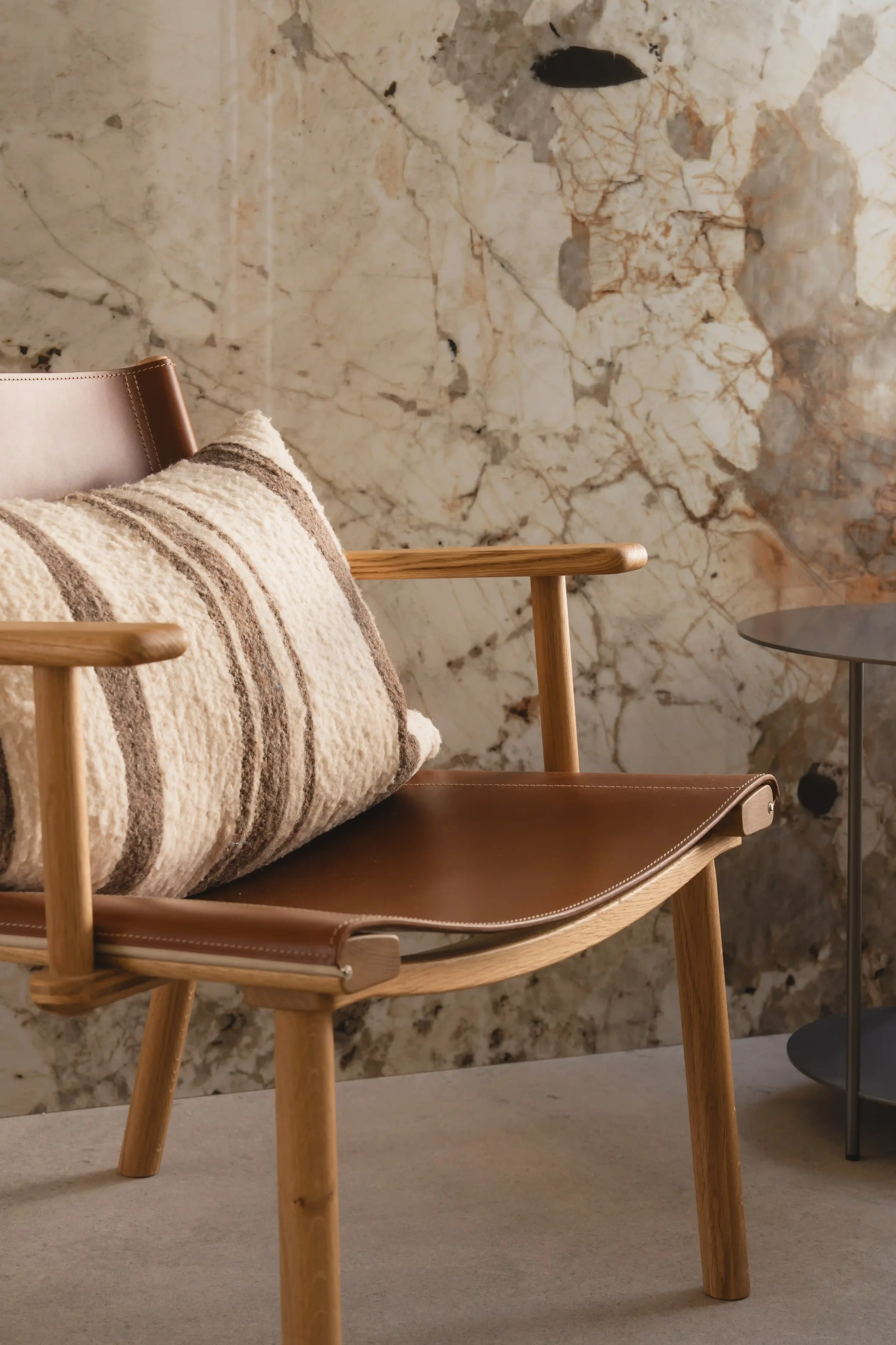 Textured oiled ash or smoked oak frame highlighting fine craftsmanship.