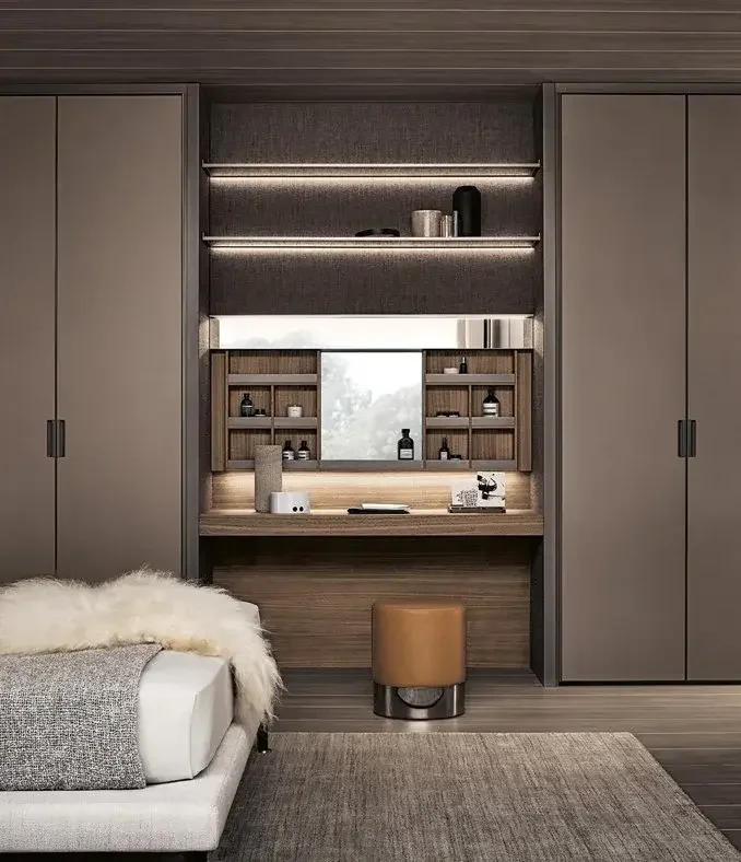 Rimadesio wardrobe with built-in wooden vanity, shelves, and gray cabinets, supplied by Abitalia South Coast in Dorset, Hampshire, and Surrey.