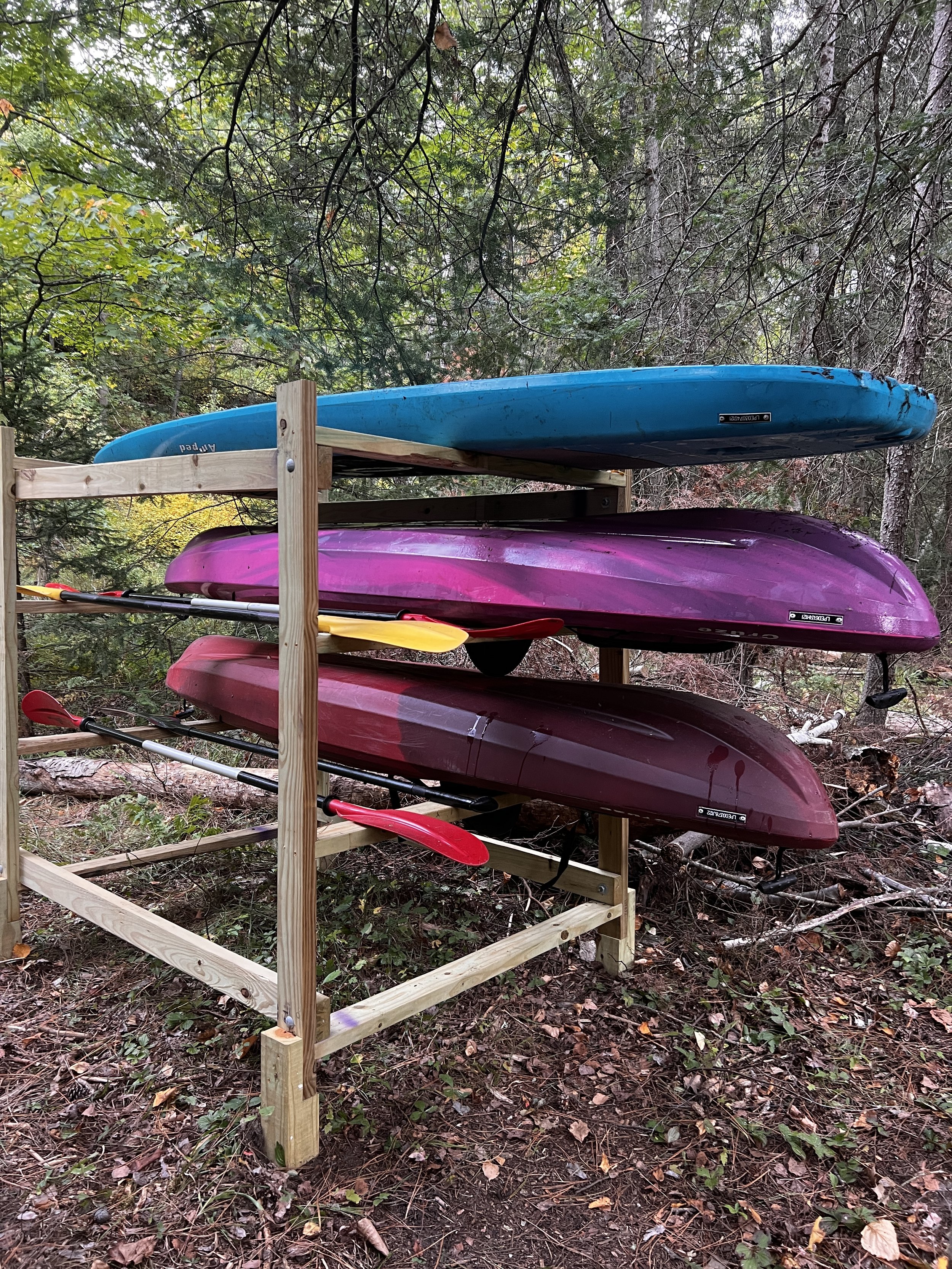 Kayaks and paddle board available for use