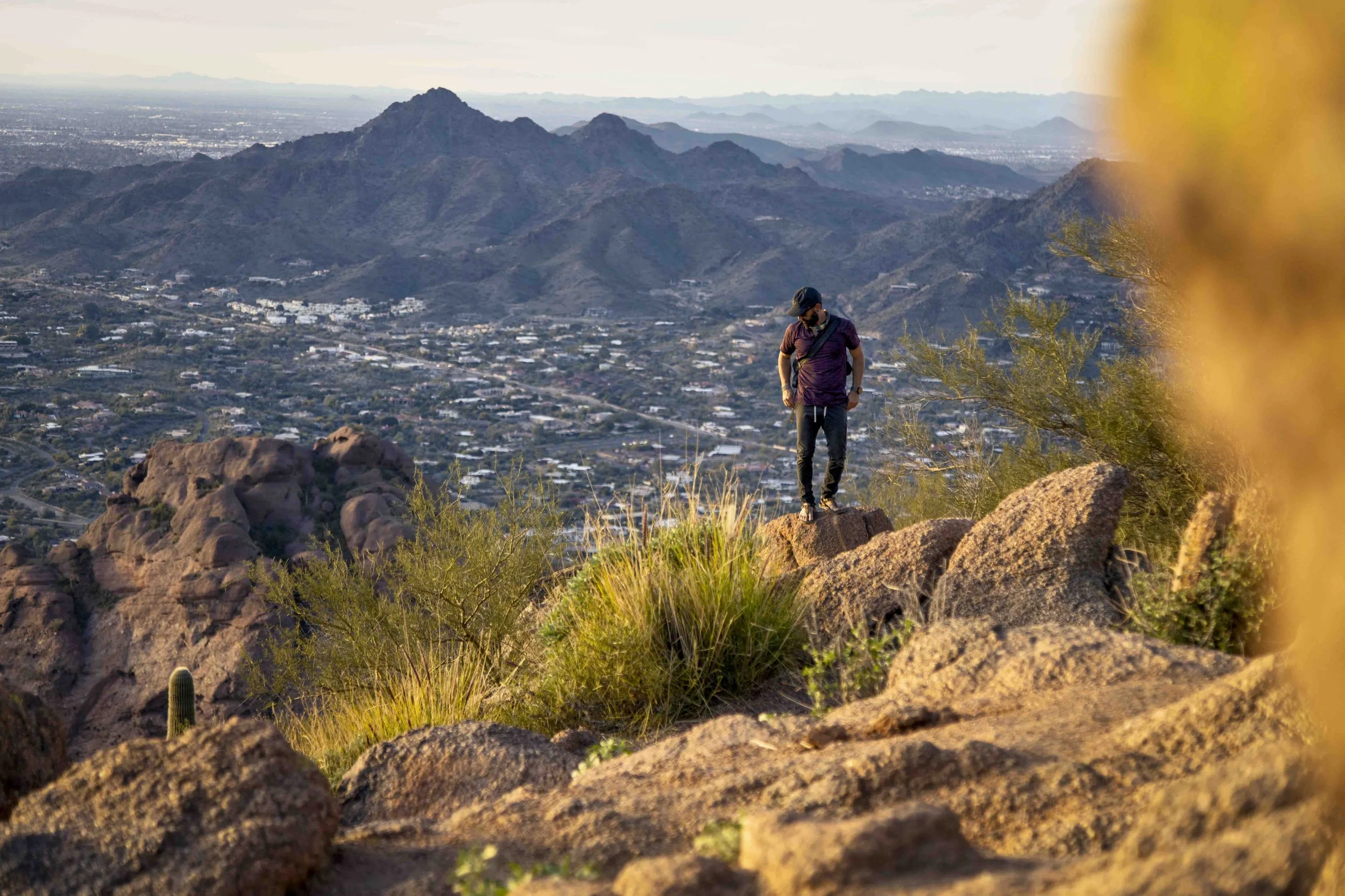 Man on summit of Camelback Mountain