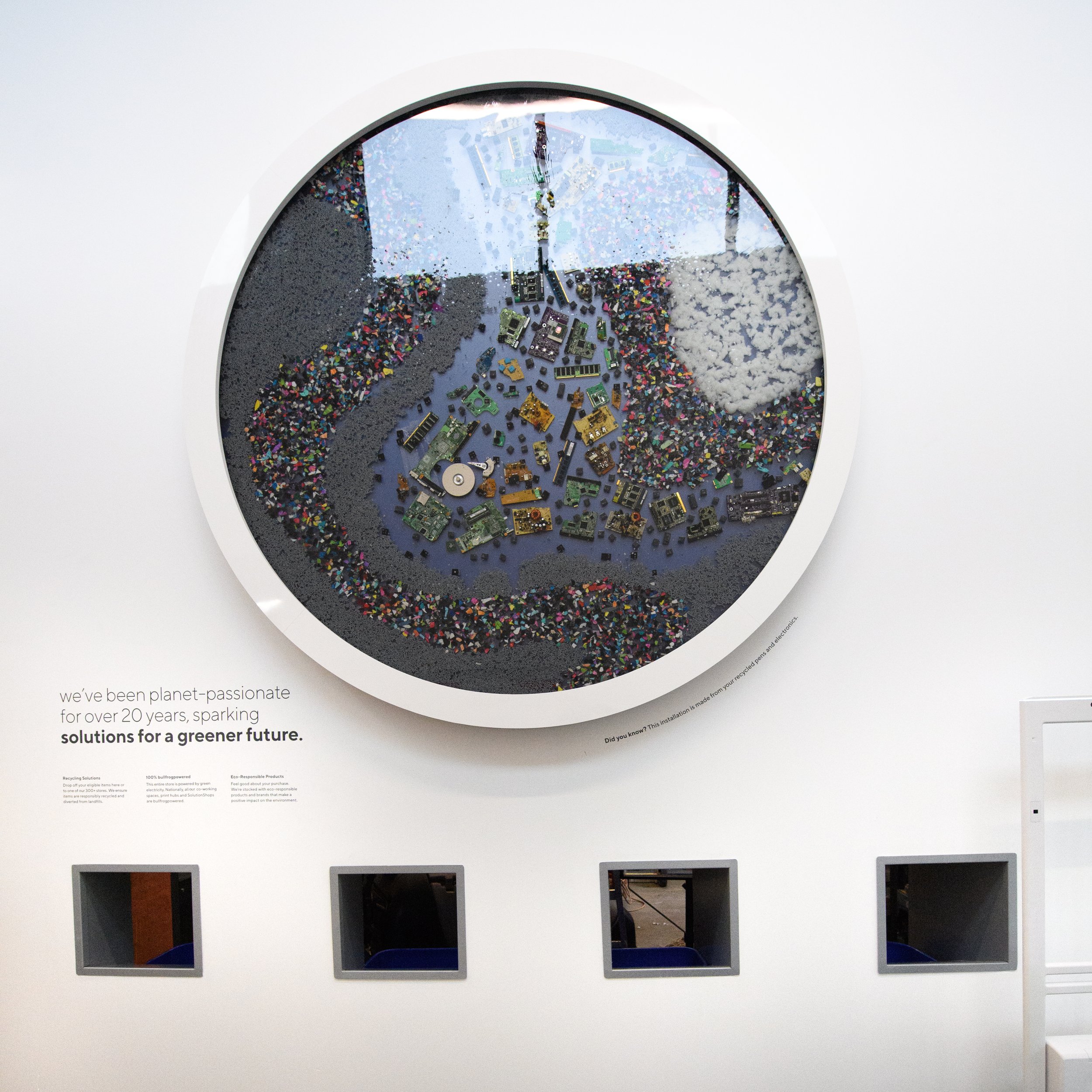 Staples has been planet-passionate since 1991. This inspirational installation features recycled materials framed in resin. 
