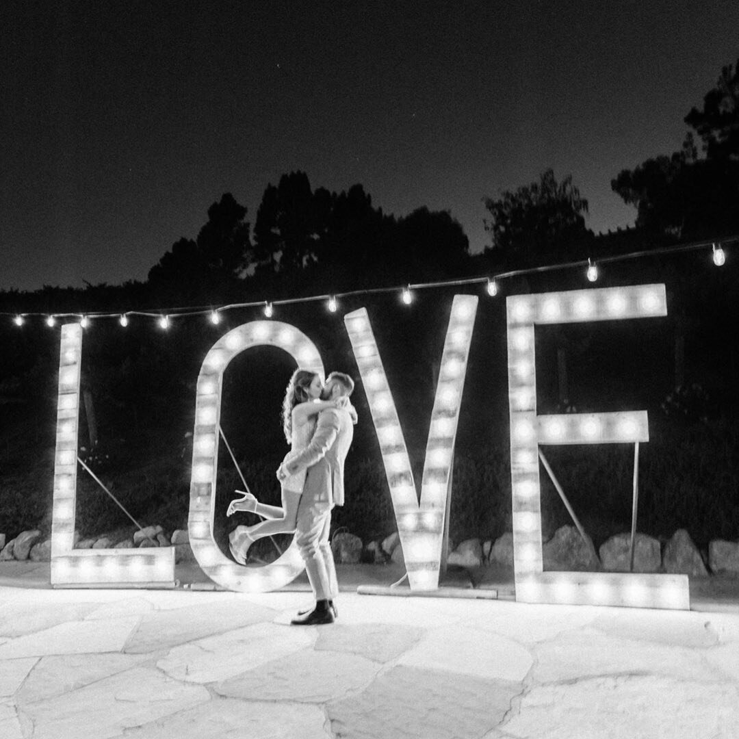 Dancing under the stars in front of the big LOVE sign at @nellaterra is the best way to end your wedding day. ✨