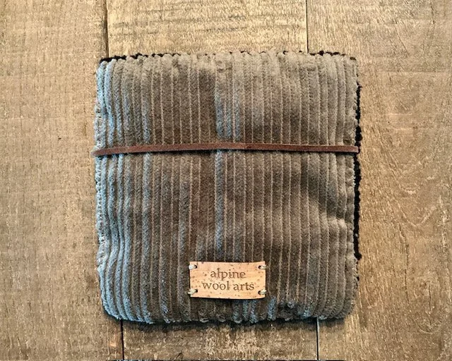 Back of wool panel with slate cotton corduroy backing.