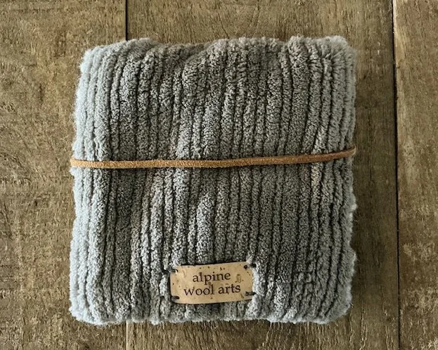 Back of wool panel with stone-gray corduroy backing.