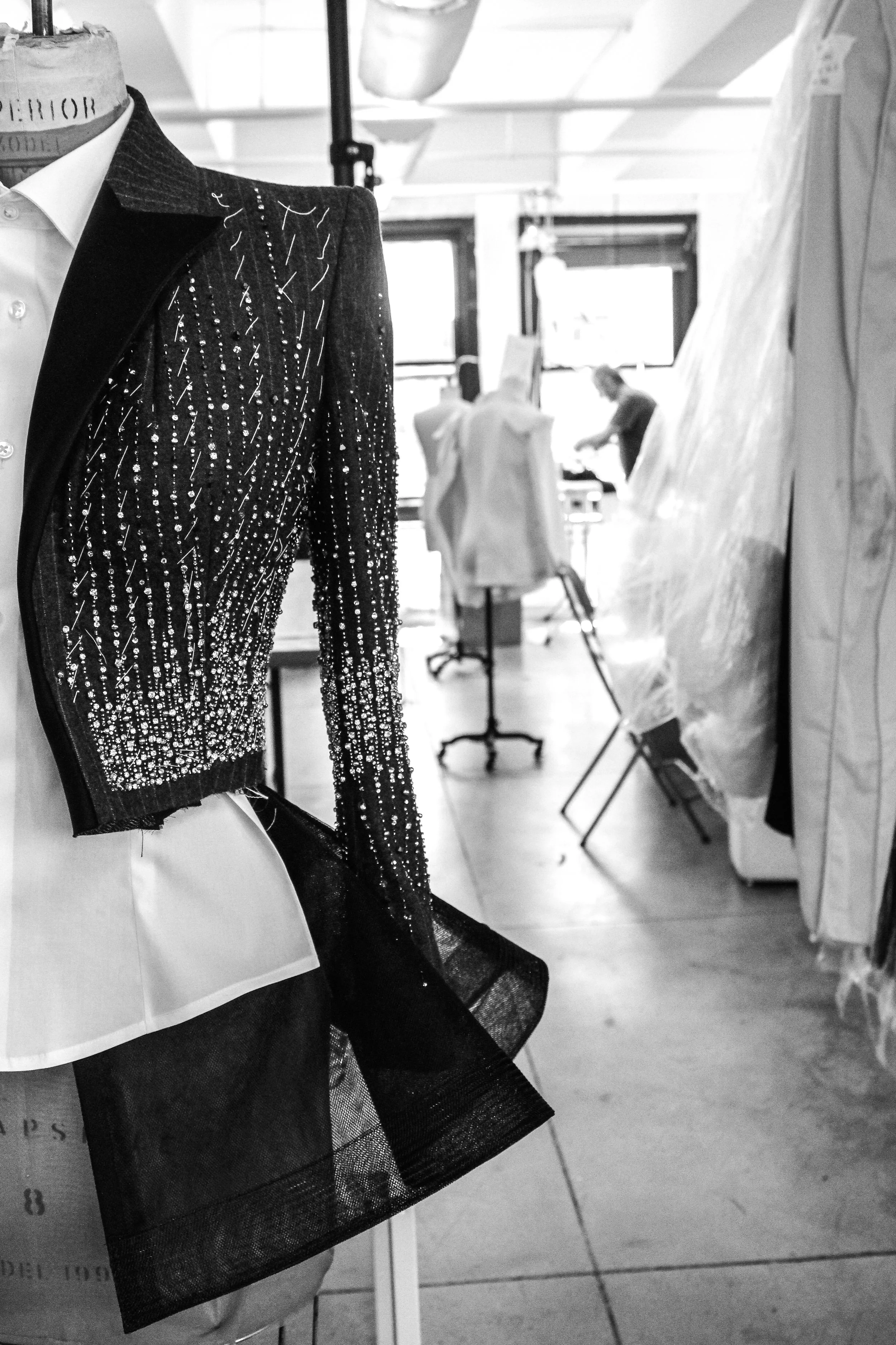 Tailored Roots
My father, Joel Diaz, learned patternmaking and tailoring from a young age, creating his first dress in his mother's dressmaking shop in the Dominican Republic at age 12. In the early '90s, he moved to New York City with nothing but t