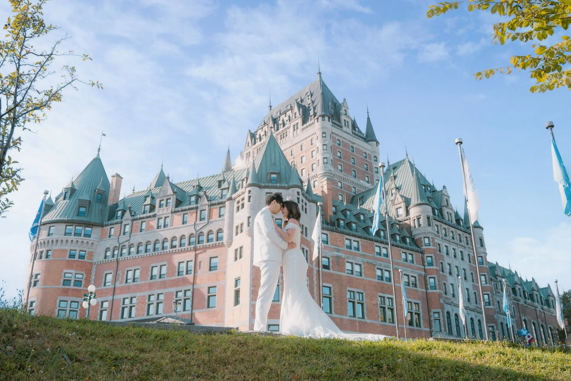   Couple close up in front of castle  