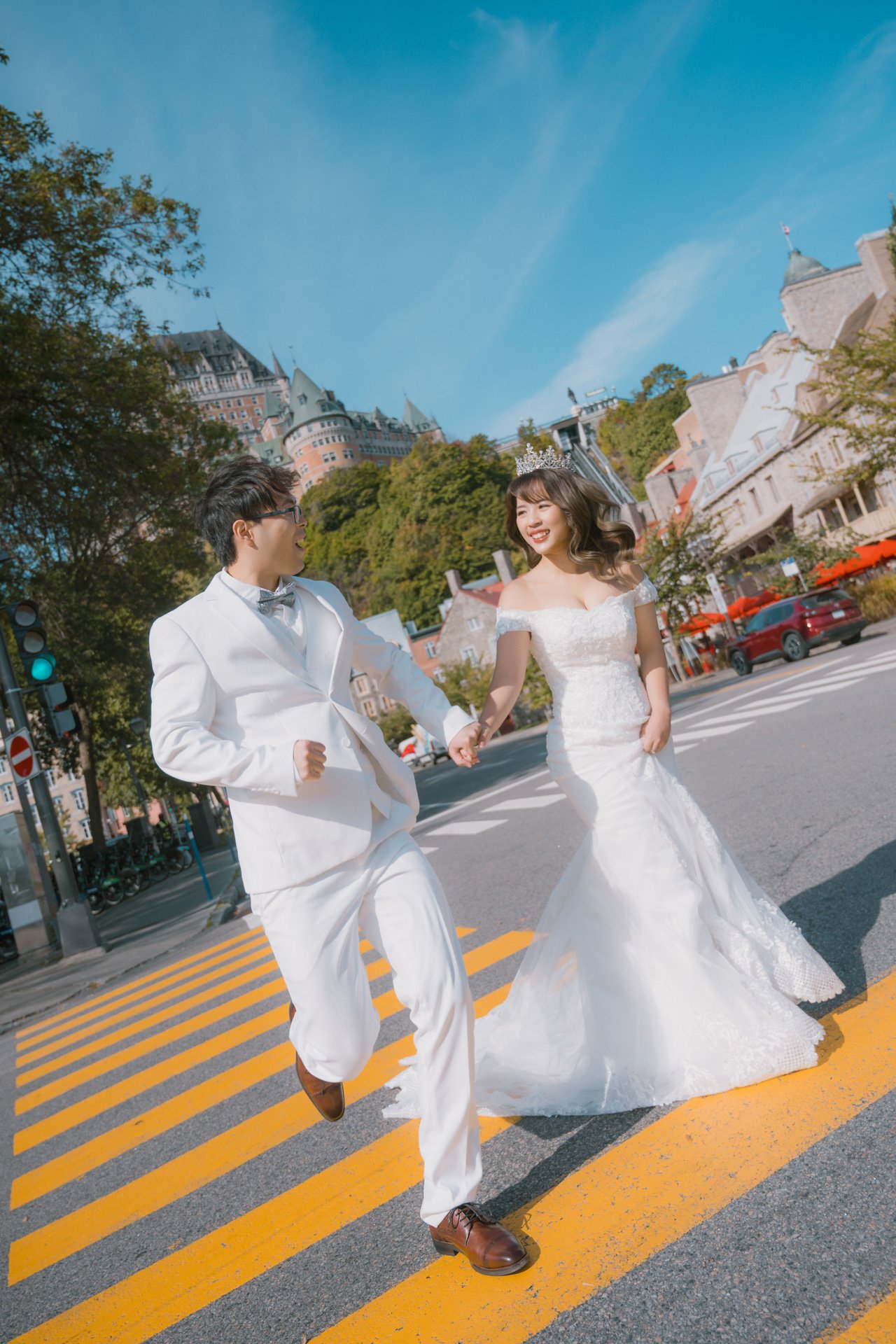   Couple running across the crosswalk  