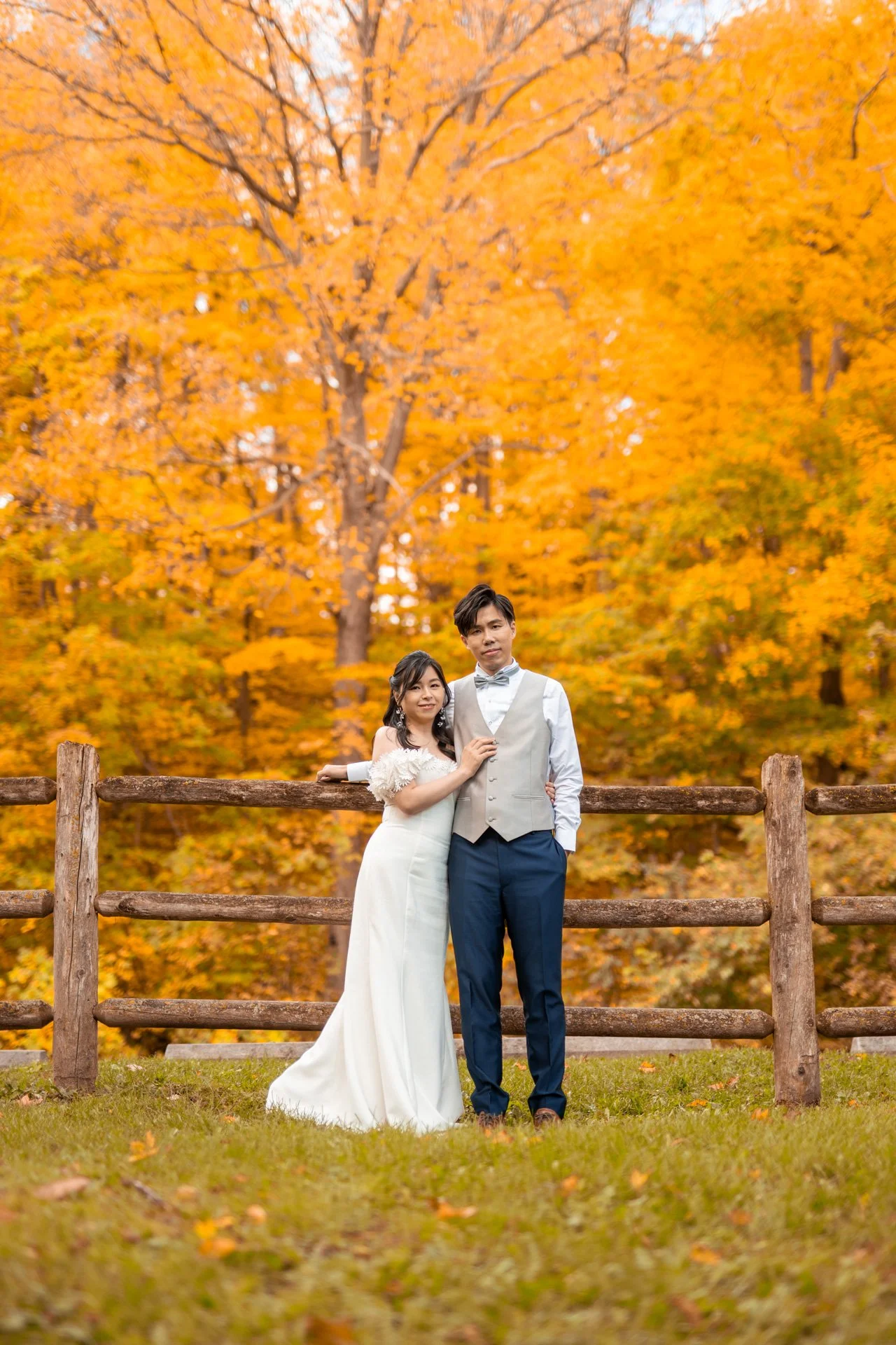 Full body shot standing by the fence