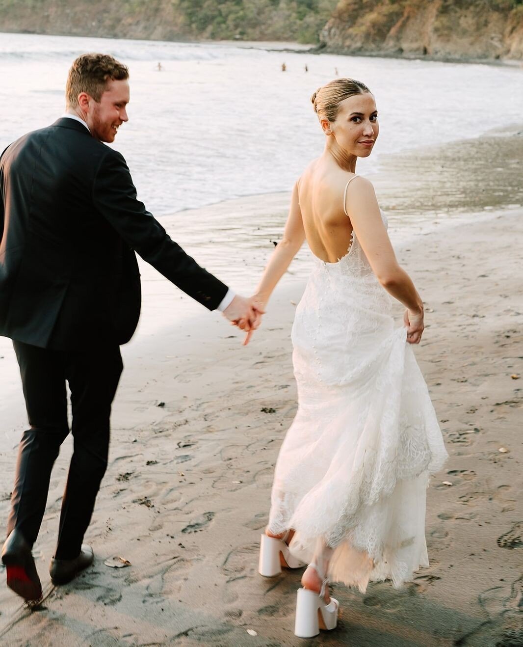 A moment for the shoes, please. ⁠
⁠
Jenne kept her look super clean and classic (sleek bun, fitted Monique Lhuillier dress) but her shoes broke the mold. I love the little details that make your wedding look *yours*. ⁠
⁠
⁠
⁠
⁠
ESSENTIAL PRODUCTS FOR 