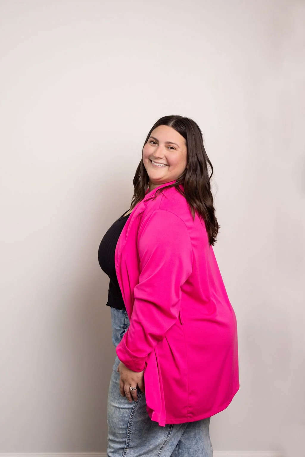 Jess fry Body Image Coach turned away from camera smiling over her shoulder