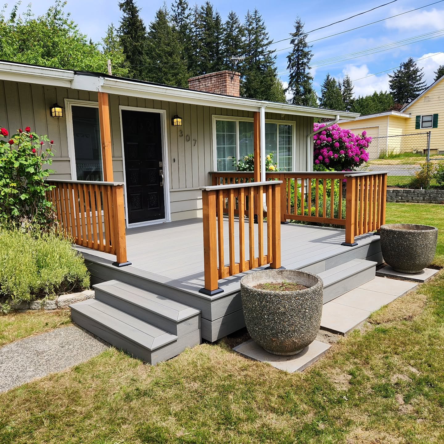 That's a wrap! It doesn't always have to be super intricate and really high-end materials, these folks just need a safe, attractive new front deck for their family to enjoy, and they are loving it!