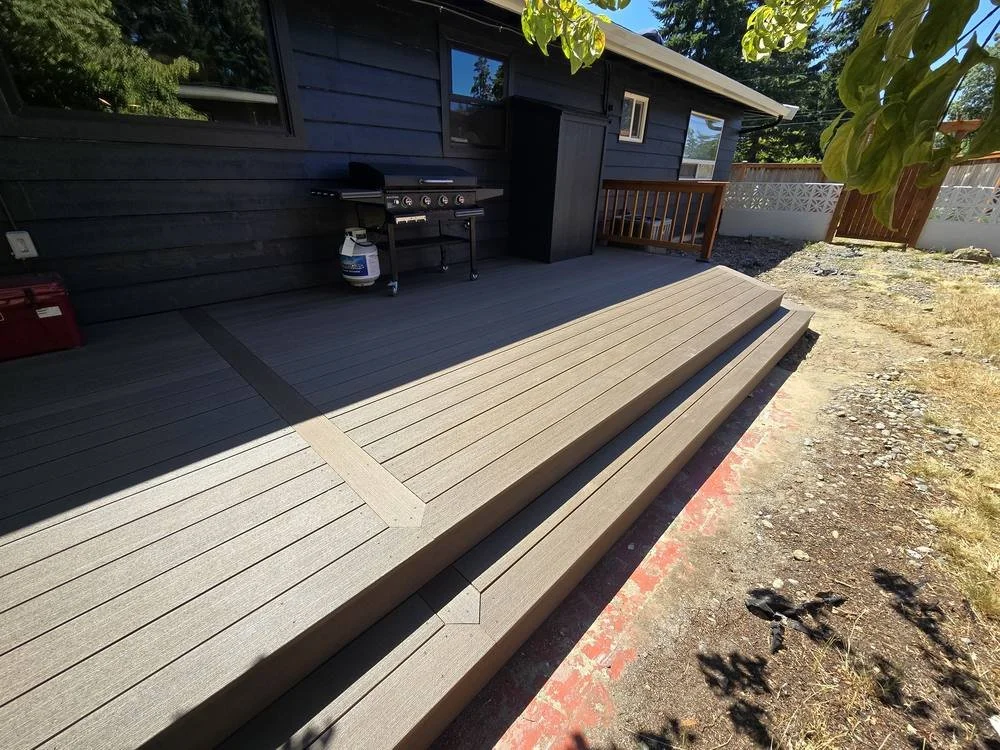 TimberTech Dark Cocoa composite decking with breaker board and mitered border steps