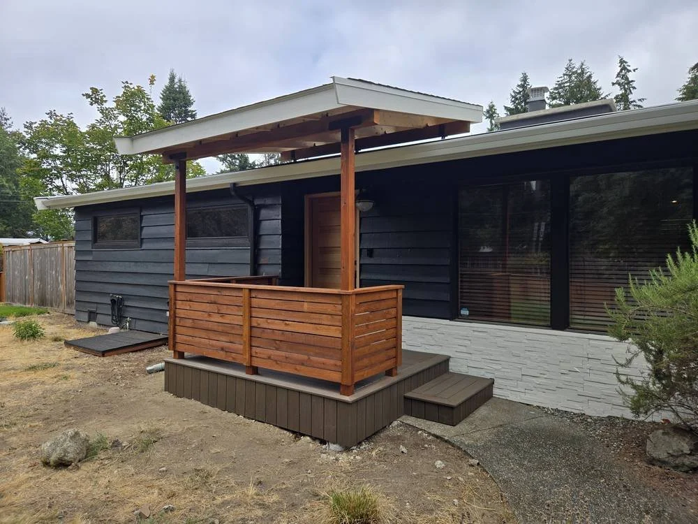 Edmonds covered front porch with composite decking and horizontal cedar railing