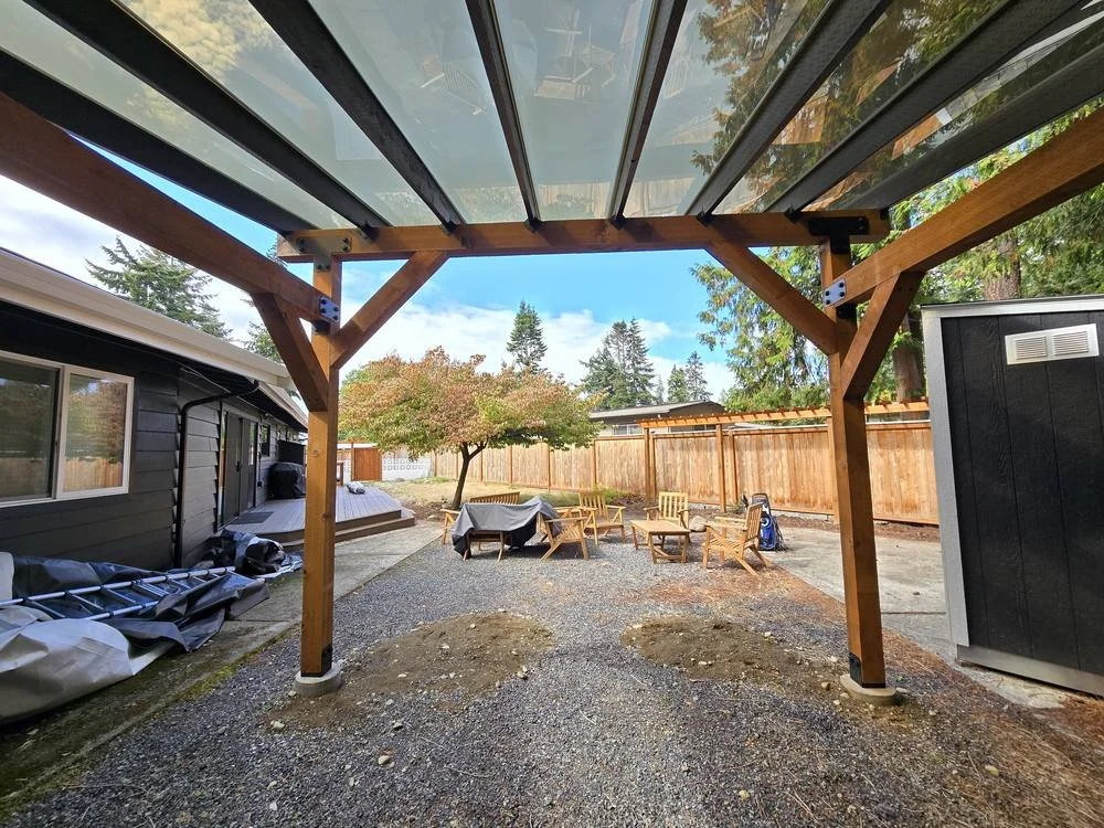 View from under the polycarbonate patio cover toward the backyard
