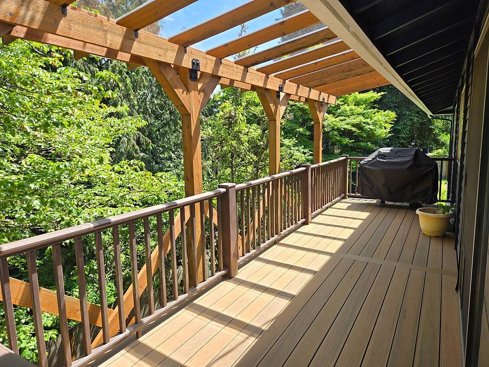 TimberTech Coconut Husk composite deck rebuild with a timber patio cover and clear polycarbonate roof