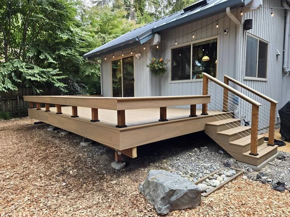 Composite deck with a wraparound bench seat in Edmonds, WA