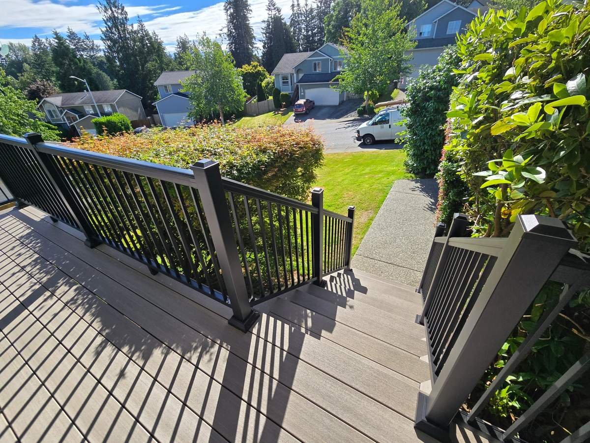 New front porch stairs with aluminum picket railing in Lake Stevens