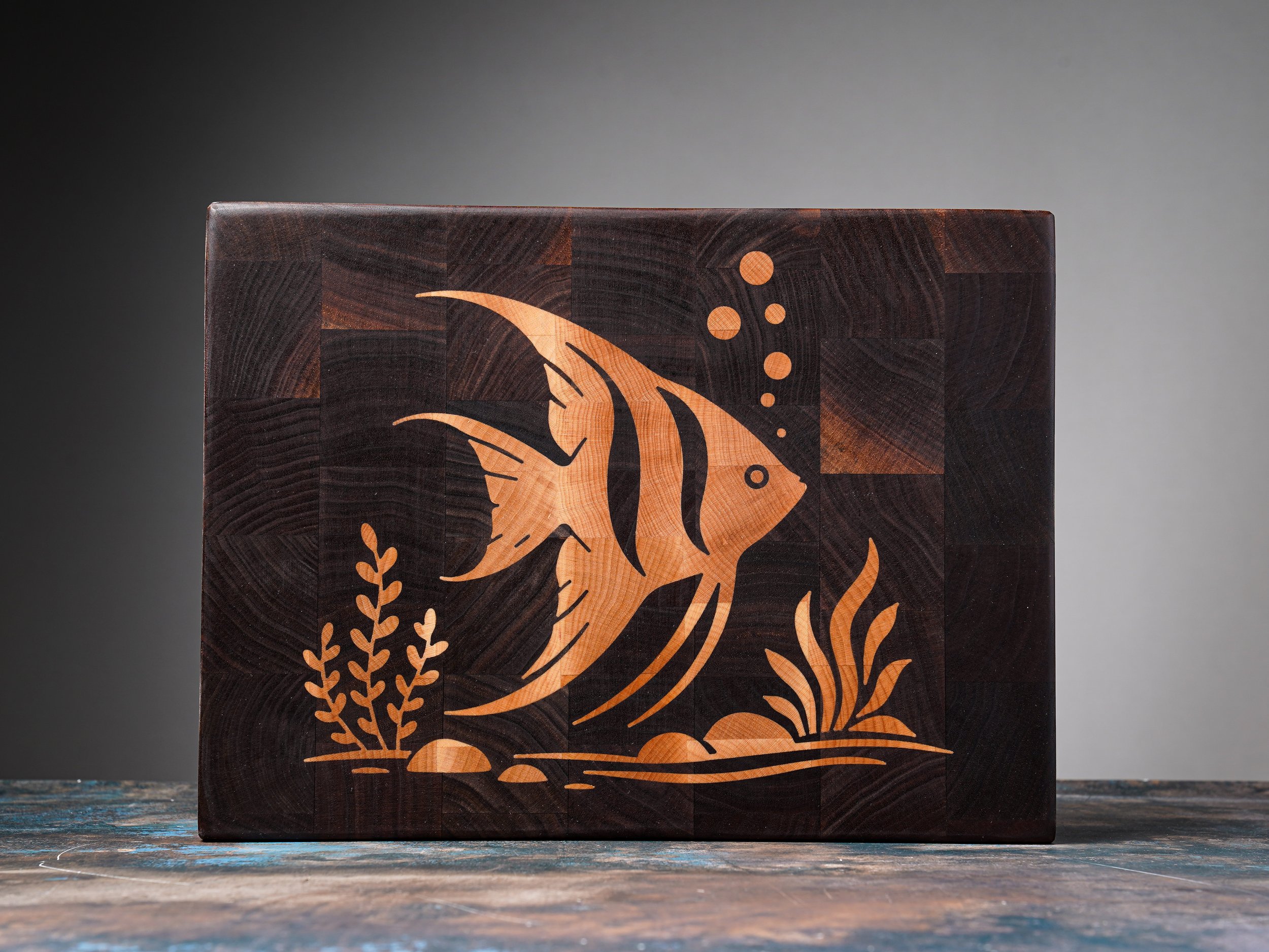 Walnut and grain cutting board with maple inlay. Size 12 x 9 x 1.1/8 in