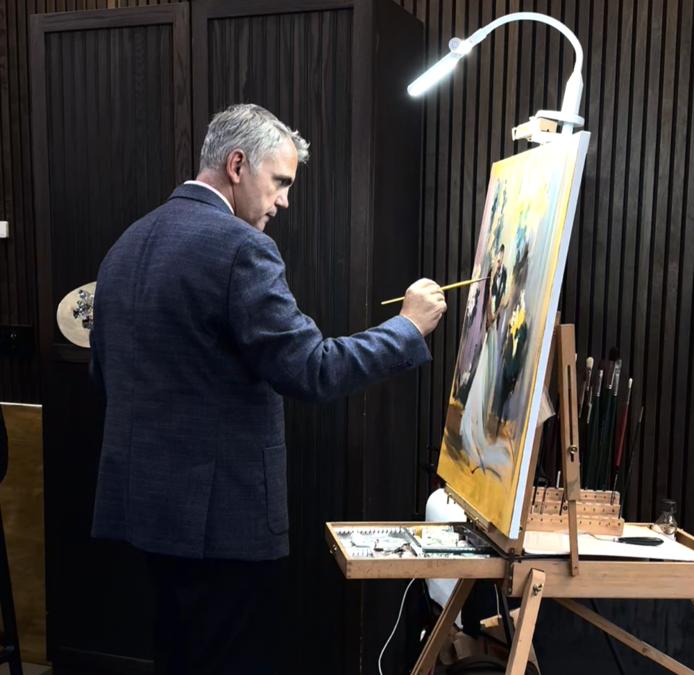 Portrait of wedding painter and fine art portrait artist Flladi Kulla.