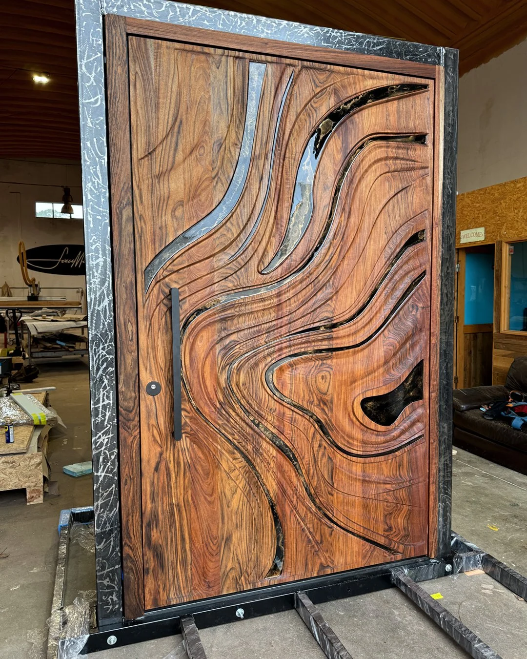 Saumarra door being carved in the workshop