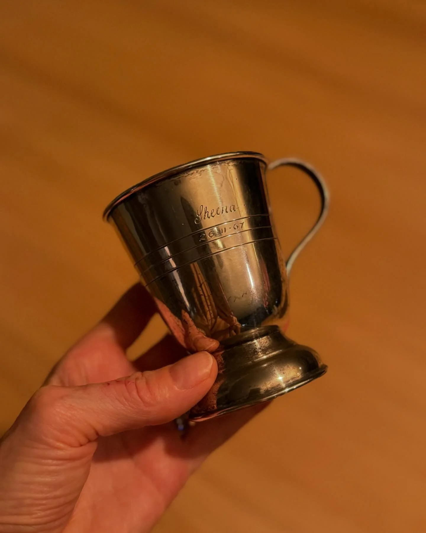 This silver cup found its way back to me,  carrying a date that changed my life forever—the day I was adopted.
26th November 1967
My mother bought this cup to mark the day. 
It’s fascinating how objects like this can hold memories, not