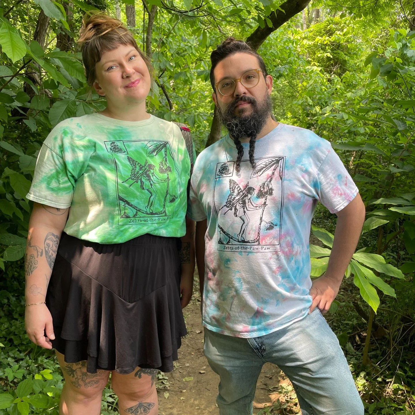 Hello party people (by party people I mean lovers of nature and art). I am going to place a small order of these amazing tie dye pastel rainbow tees (see slide 2) and want to know which design I should screen print on them. 
1. marbled salamander (sl