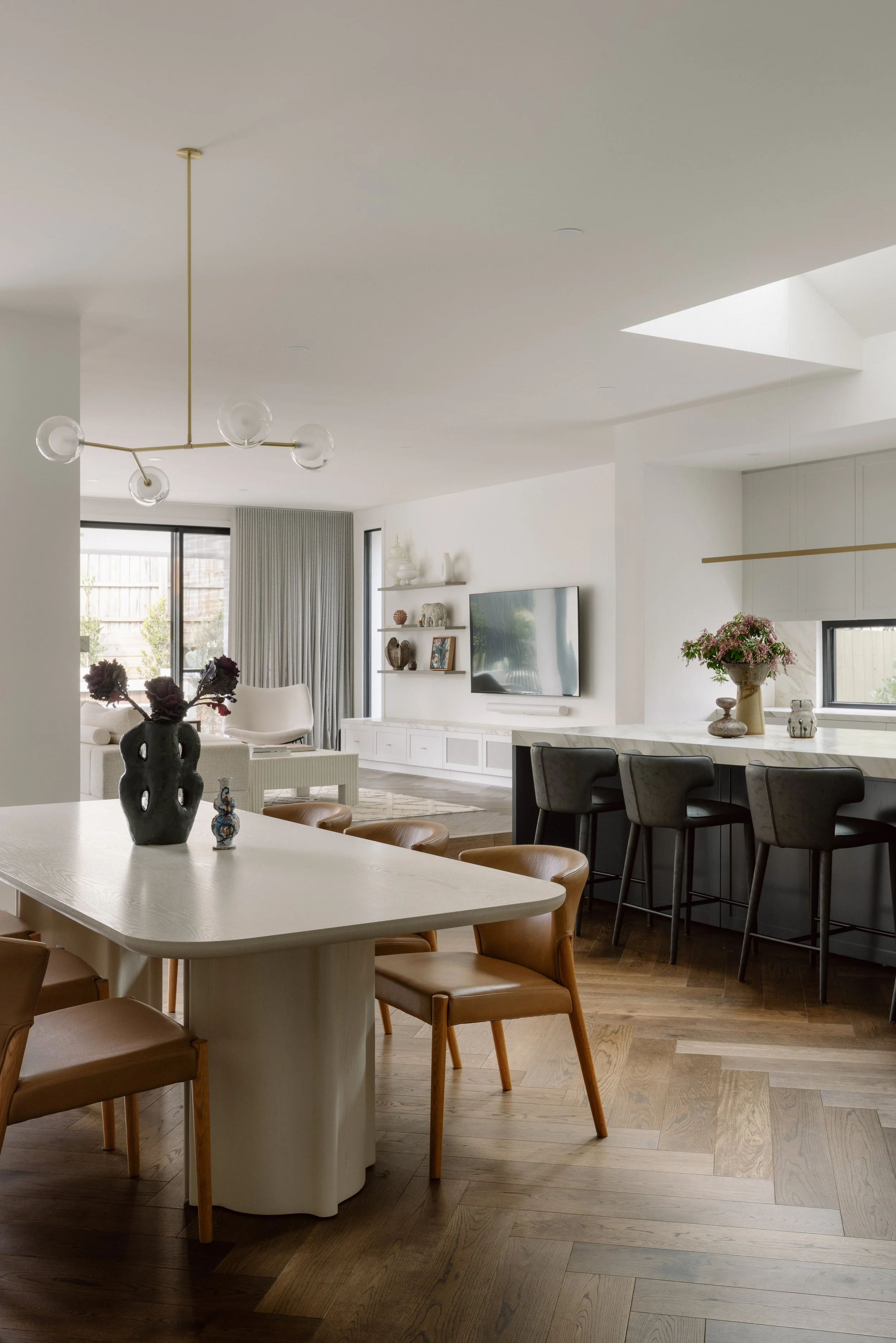 Dining room with brass branch pendant