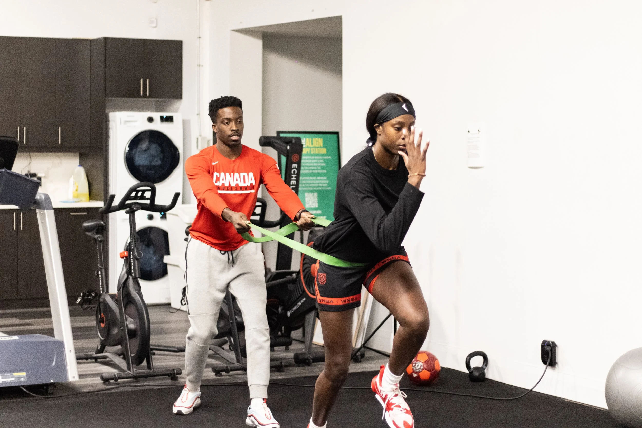 Athlete performing banded resisted sprints