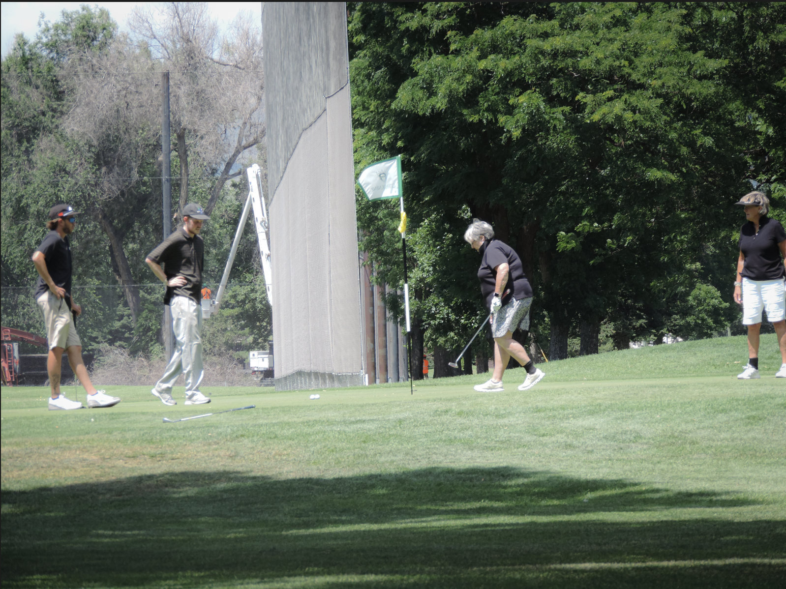 The opponent sinks the match winning putt on the 9th green at City Park Nine golf course on July 11th 2025 at 12:15 pm for a photgraphy essay