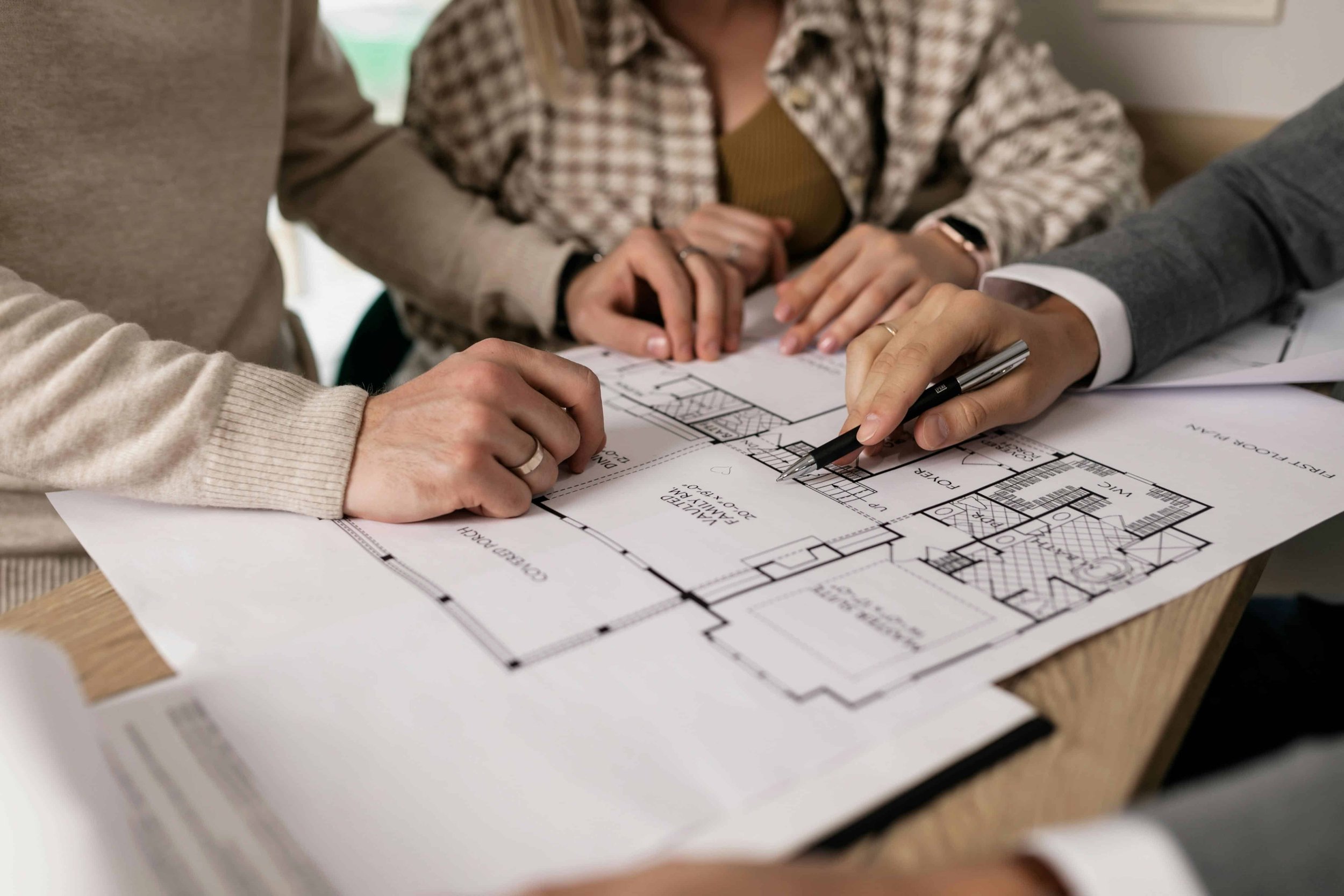 Reviewing architectural drawings during the design and planning stage with AMW Builders in Bendigo.