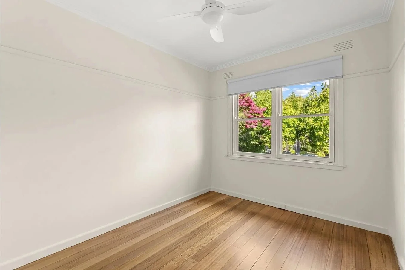 Updated bedroom renovation at Hargreaves Street in Bendigo with restored timber flooring and refreshed interior finishes by AMW Builders.