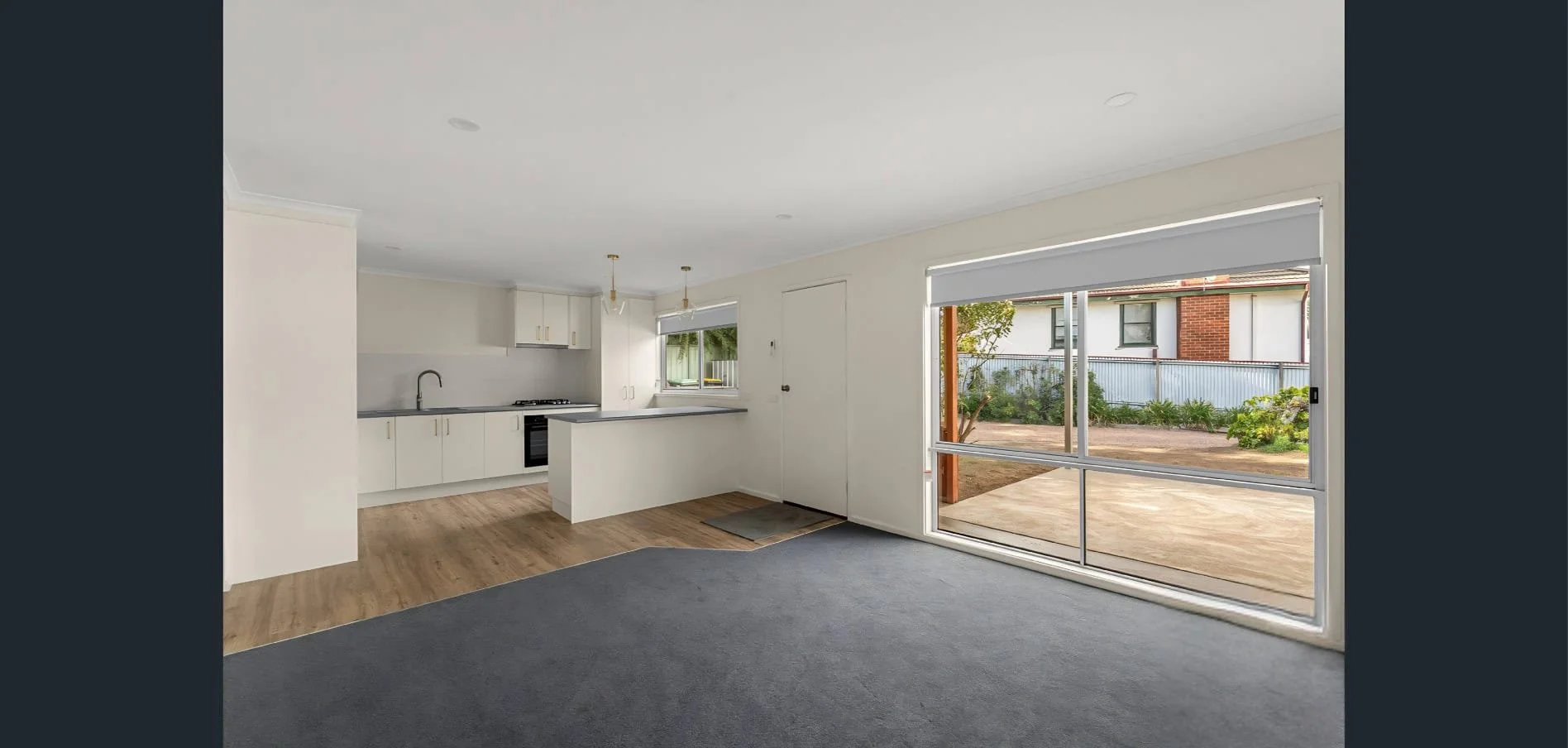 Open-plan living and kitchen renovation at Hargreaves Street in Bendigo completed by AMW Builders