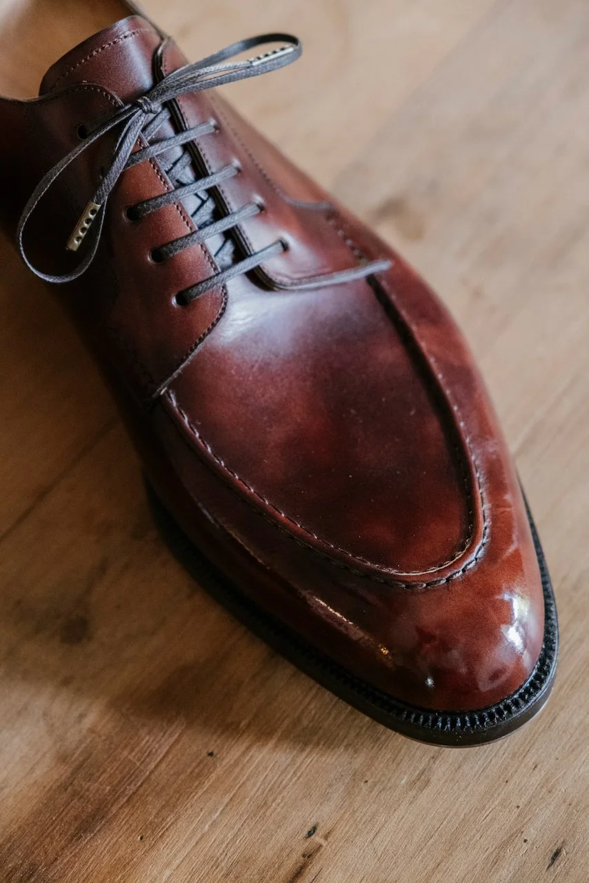 2026: Apron front derby in cognac museum calf.